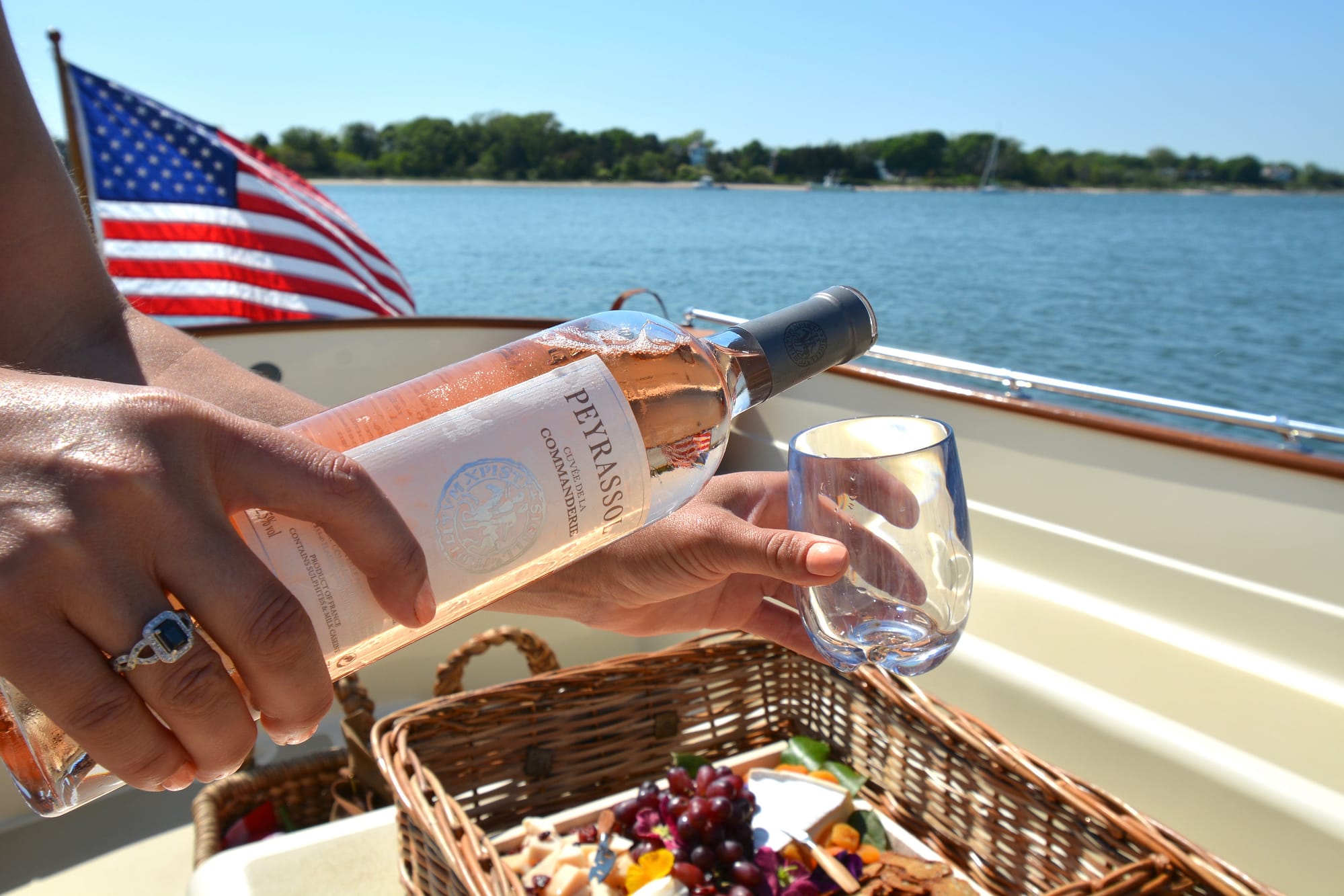 complementary rosé being served on Le Launch charter Siren.